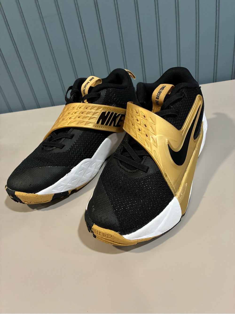 Nike Kids Black and Gold Strap Sneakers